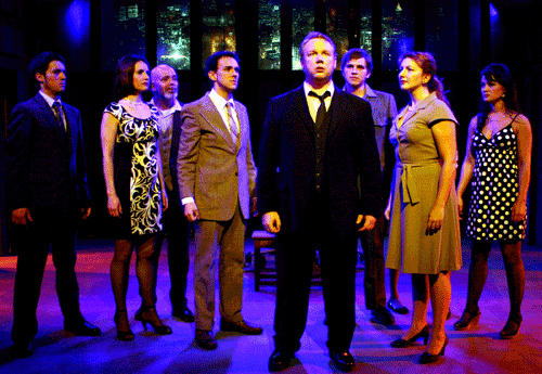 eremy Fillinger, center, with Kyle Cooper, Laura M. Hathaway, Richard Comeau, Ryland Dodge, Andrew Eddins, Amie Bjorklund and Liz Holt in 'Merrily We Roll Along' at Chance Theatre