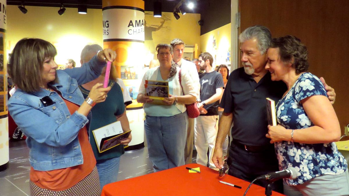 Luis Fuerte with fans after book-signing at Chapman University, photographed by Gloria, his wife.